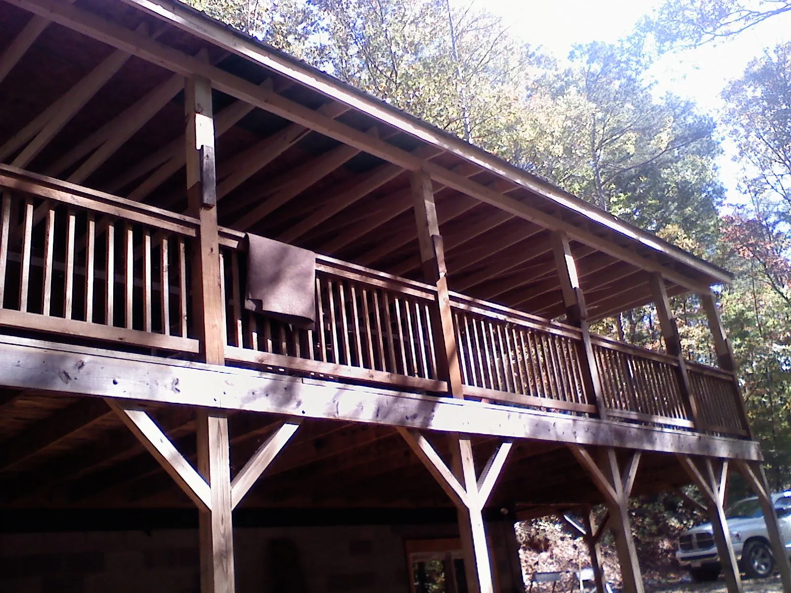 Timber framing under a new elevated porch and deck — Roof Leak Repair in Kersey by Roofing Brothers